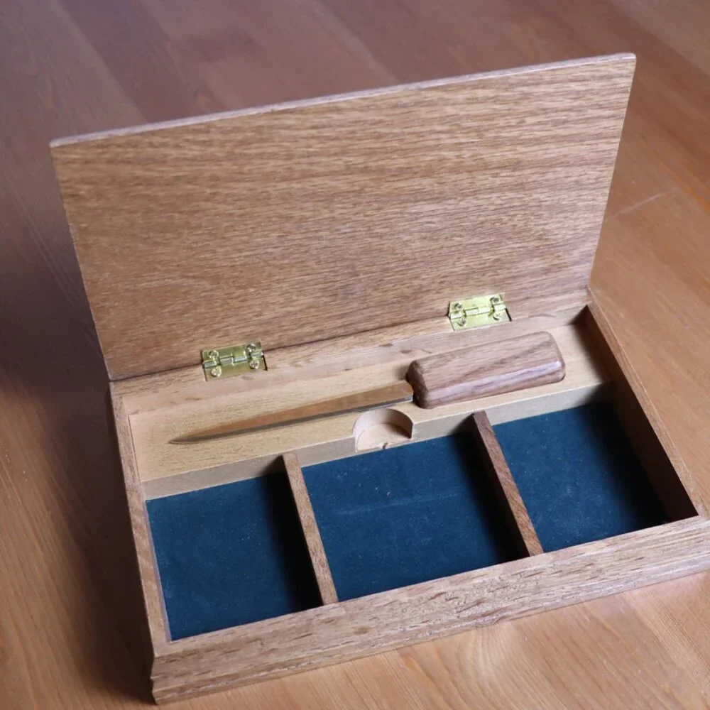 Wooden box for desk with letter opener, small carved fish on top, lid opens,